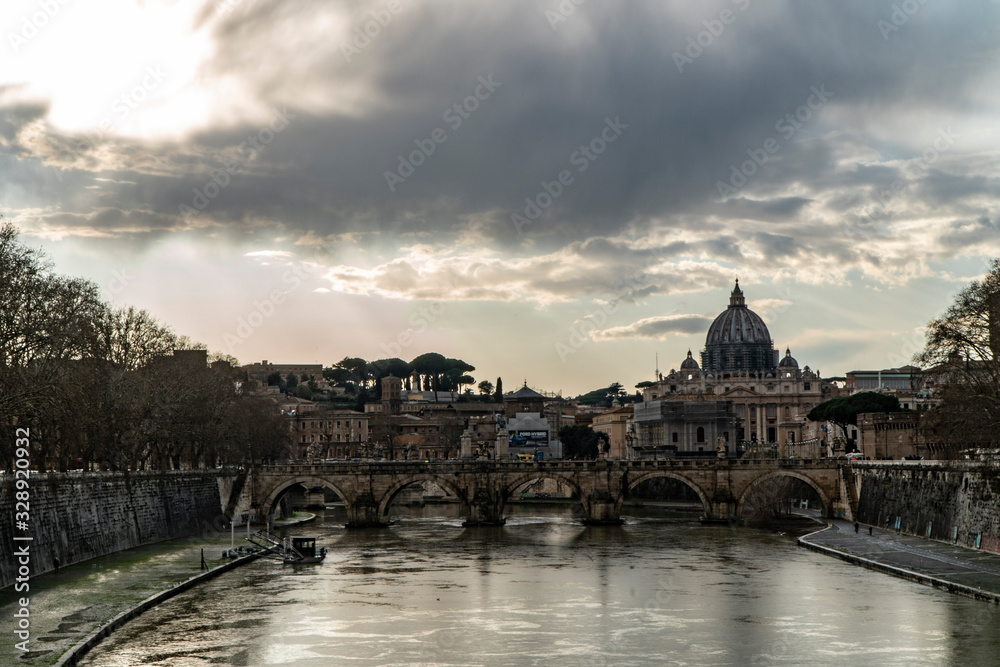 The Papal Basilica of St. Peter, west of River Tiber in Rome, Italy cloud day