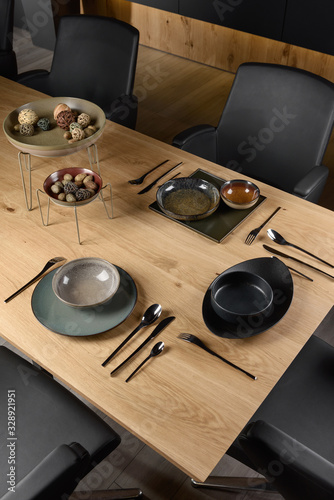 beautiful tableware on a wooden table, modern kitchen