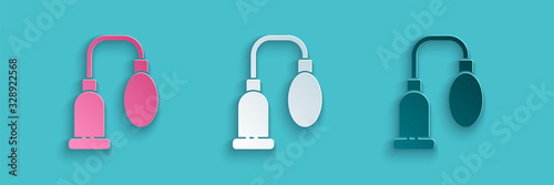 Paper cut Penis pump icon isolated on blue background. Penis enlarger. Sex toy for men. Vacuum pump with a blower to increase the penis. Paper art style. Vector Illustration