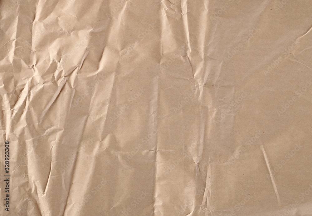 Fototapeta premium Crumpled brown decorative paper texture and background