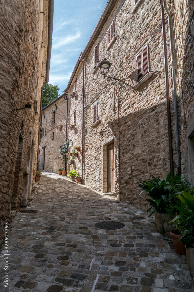 Historical center of Piobbico with ancient stone  houses and ancient church