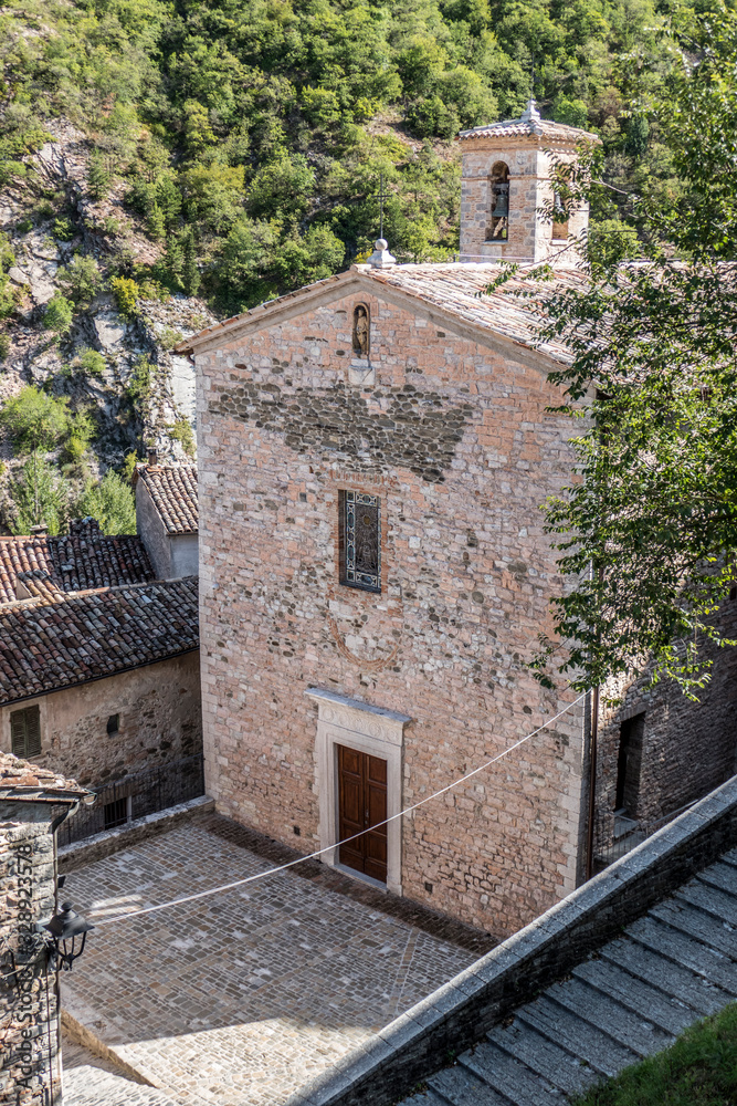 Historical center of Piobbico with ancient stone  houses and ancient church
