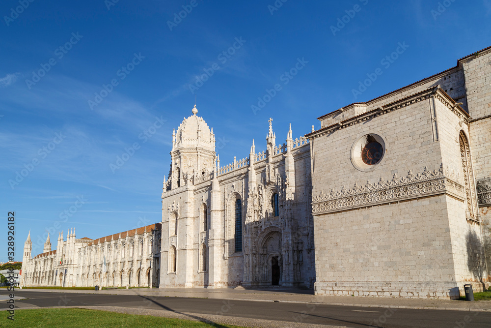 View of the historic Mosteiro dos Jeronimos (Jeronimos Monastery) in Belem, Lisbon, Portugal, on a sunny morning.