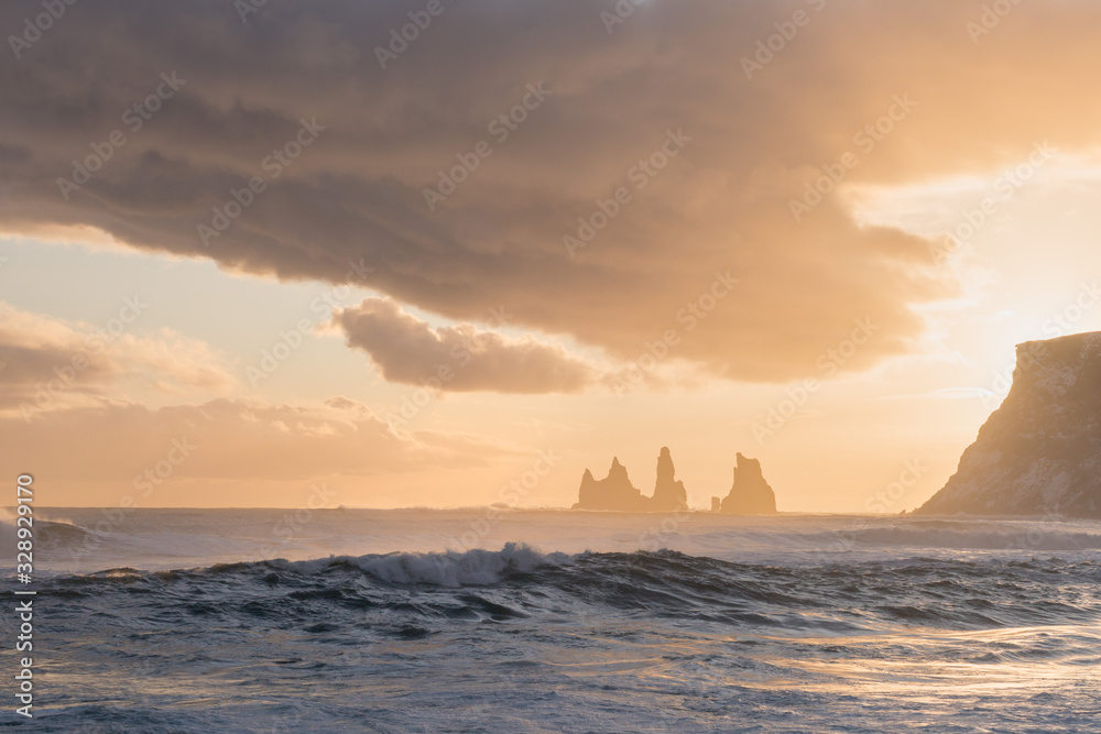 Reynisdrangar rock formations at Cape Dyrholaey, village of Vik i Myrdal. Amazing Iceland nature seascape popular tourist attraction. Best famouse travel locations. Scenic Image of southern Iceland