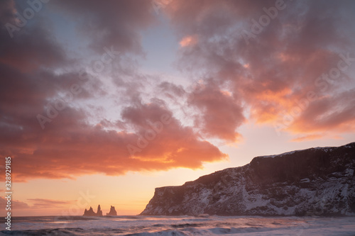 Reynisdrangar rock formations at Cape Dyrholaey, village of Vik i Myrdal. Amazing Iceland nature seascape popular tourist attraction. Best famouse travel locations. Scenic Image of southern Iceland