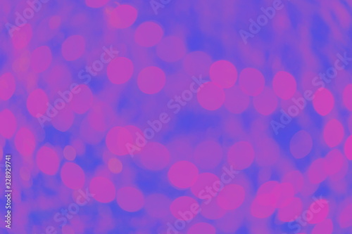 Fantasy blue and lilac background with blurred bokeh lights, abstract