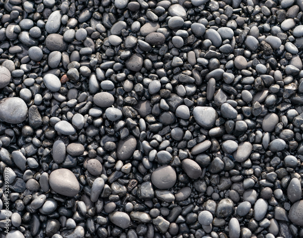 Volcanic rocks on black sand beach, Iceland Volcanic rocks on black sand beach, Iceland