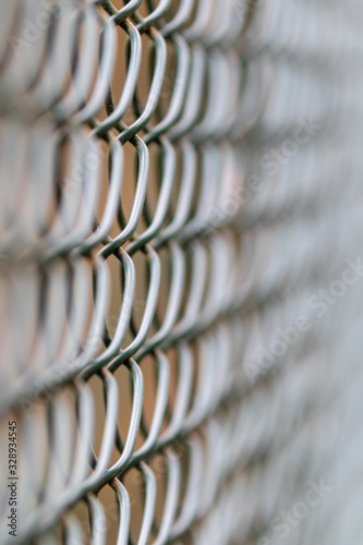 Close up of a green cyclone fence