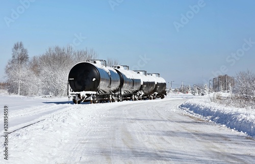  Railway wagons in beautiful winter landscape with snow.