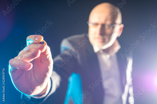 A man presses a button. Hum...