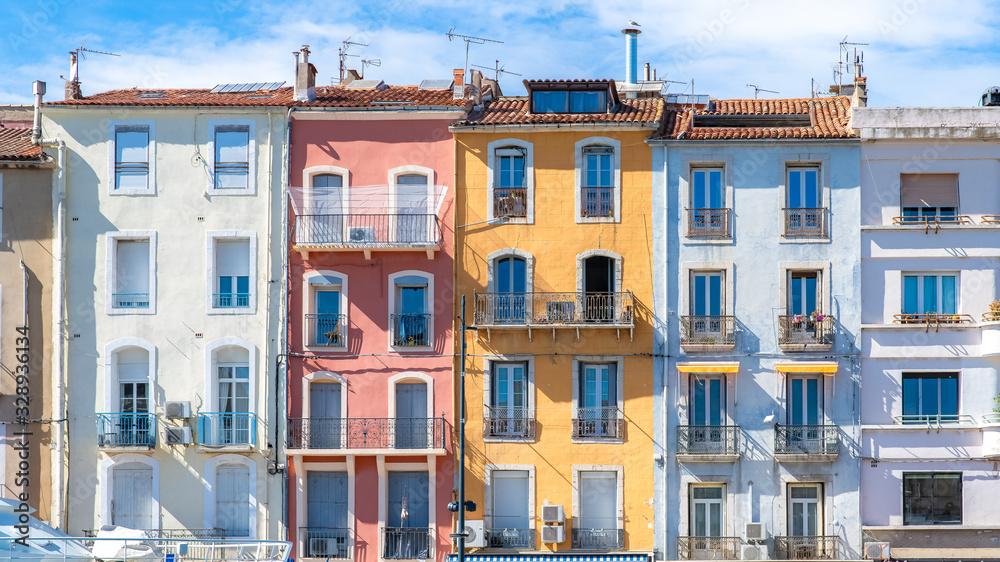 Sète in France, typical colorful facades on the quay