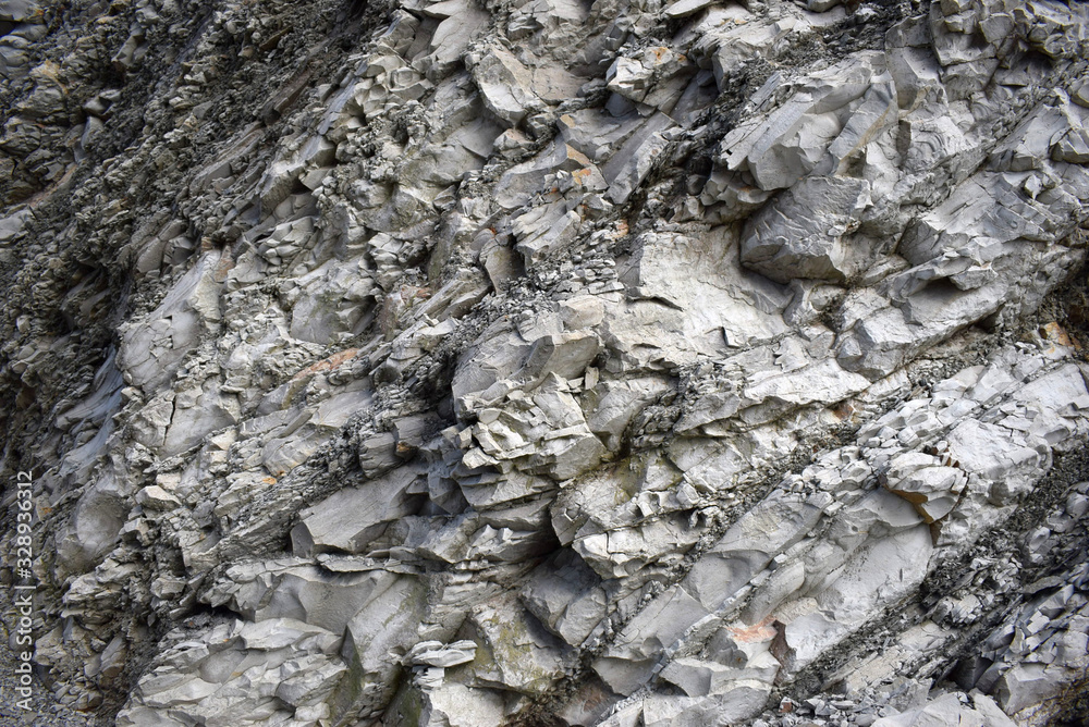 View of the sand and clay rock. Texture in black, gray, and white. View of the sand and clay rock. Texture in black, gray, and white.