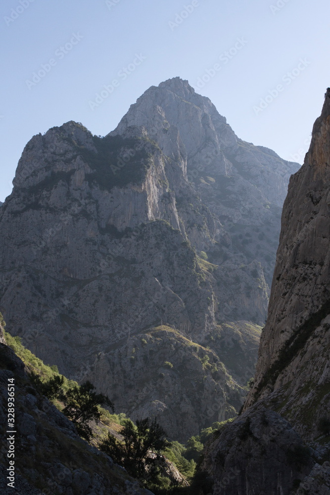 Obraz premium Cares gorges, Principality of Asturias/Spain; Aug. 05, 2015. This gorge, with its narrow passes and gullies, is right in the heart of the Picos de Europa Mountains. The area’s stunning landscape affor
