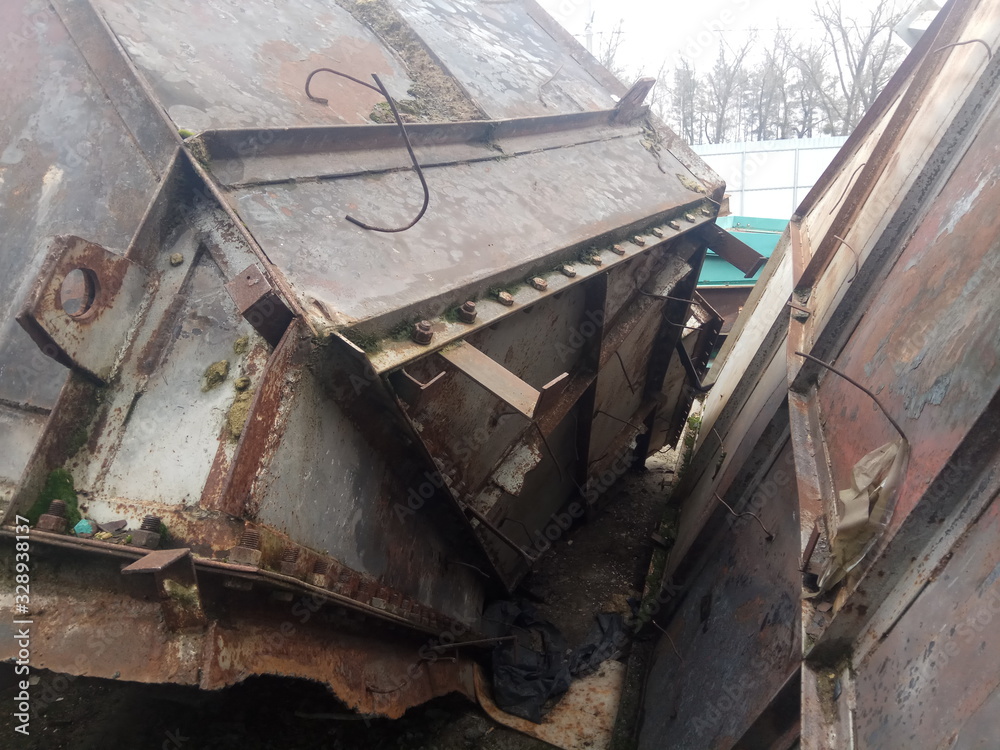 rusty metal structures at a scrap metal dump