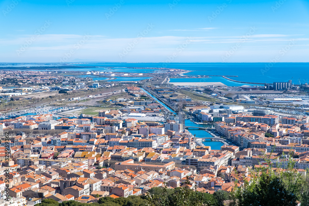 Sète in France, aerial panorama, the harbor and the city with typical tiles roofs