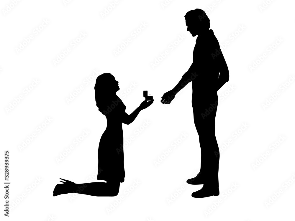 Silhouette of woman on her knees proposes marry man