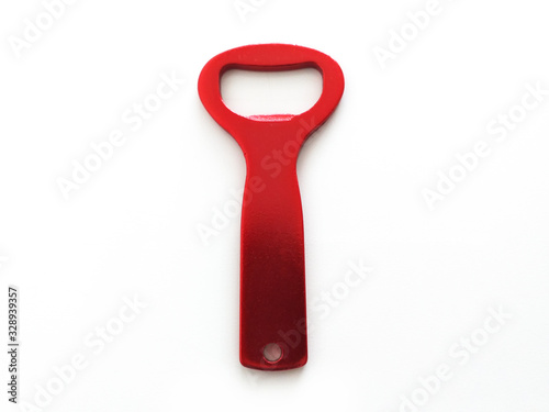 Front and vertical view of red bottle opener isolated on white background. Close up of Beer opener.