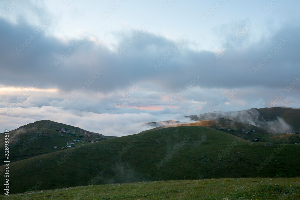 Fototapeta premium green lawns and mountains in fog trabzon turkey