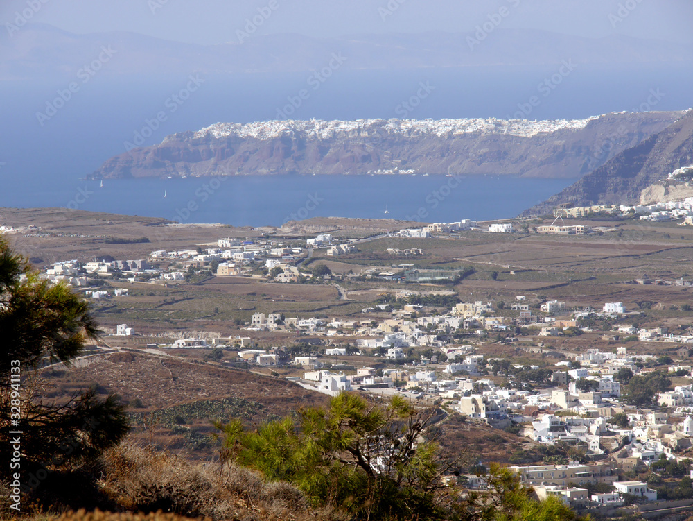 Panoramic view of Santorini island from the top of Mesa Vouno Mountain.