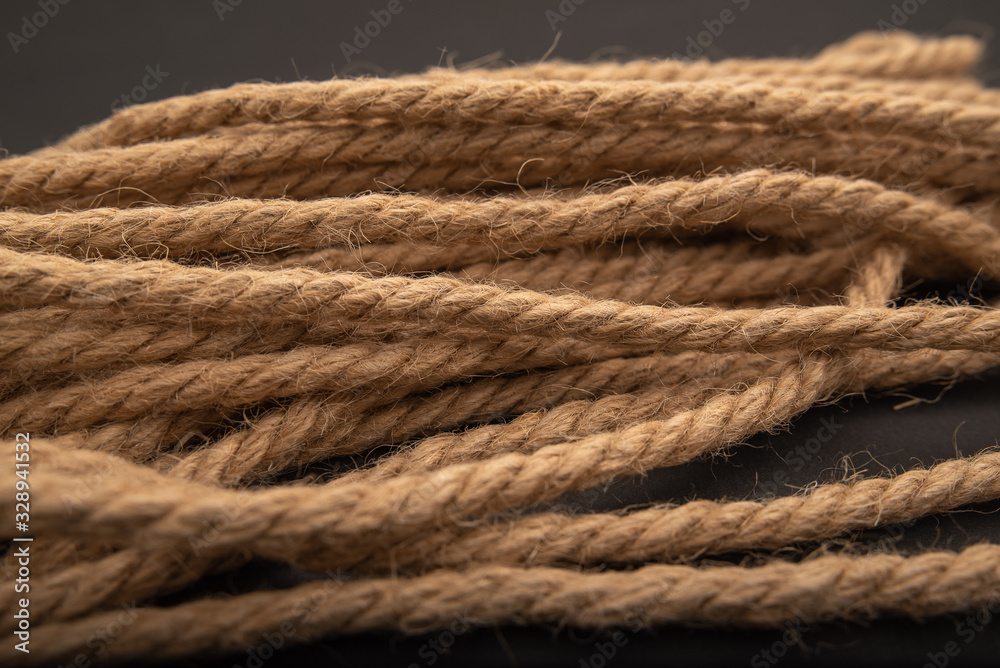 brown thick rope, rope on black background