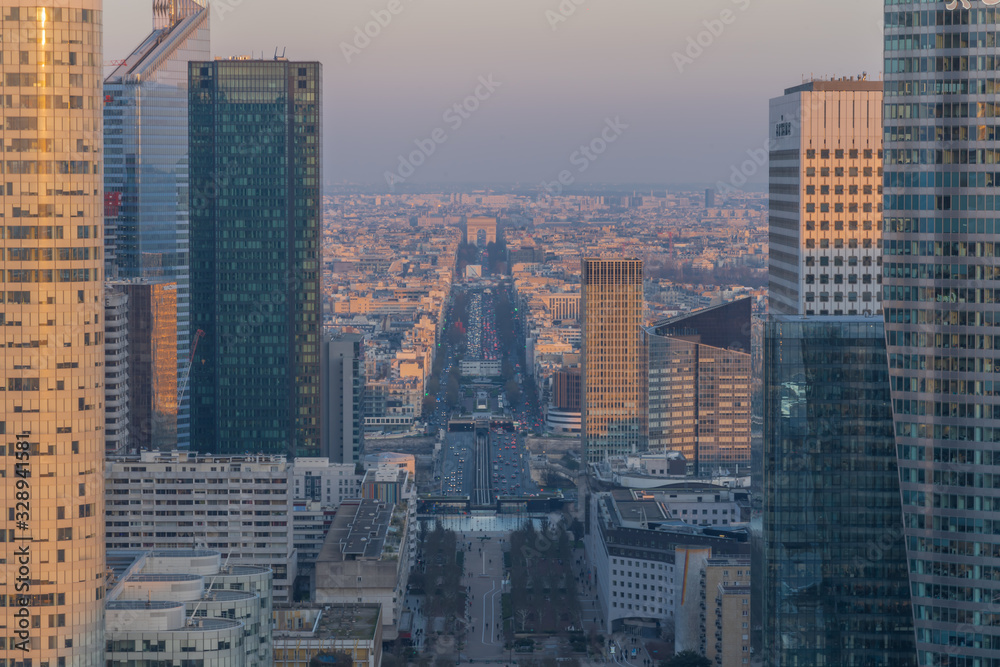 Paris, France - 03 21 2020: Panoramic view of the Defense towers district at sunset