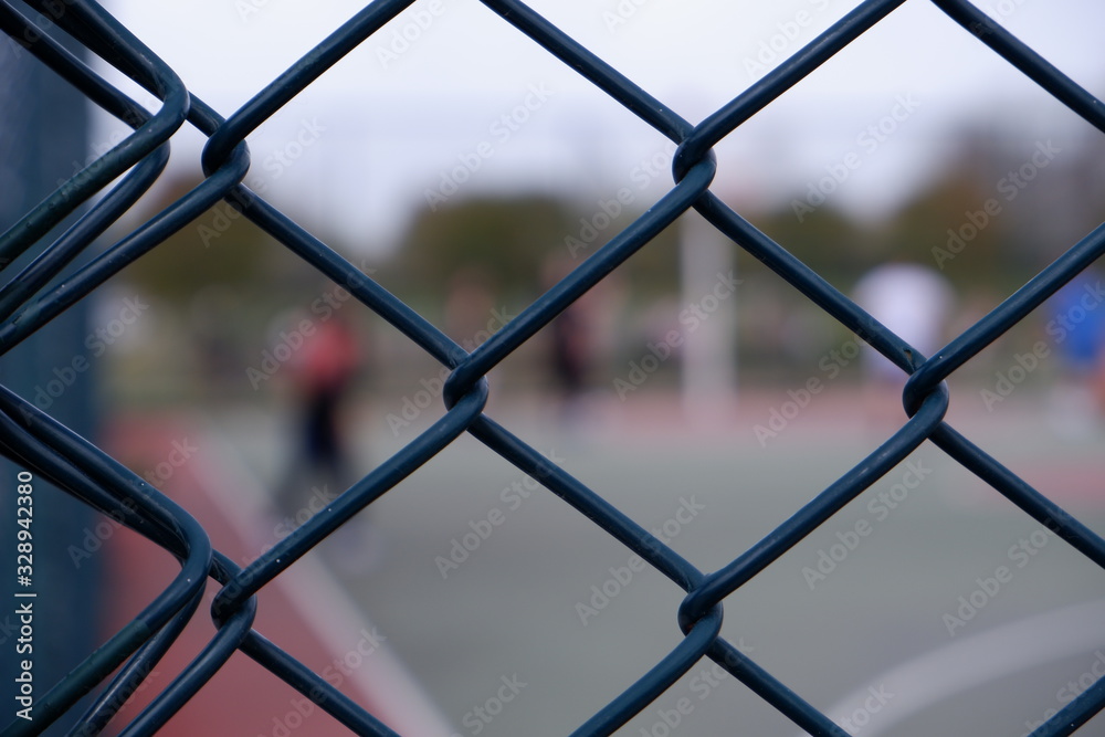 defocused basketball court in sunny day defocused basketball court in sunny day