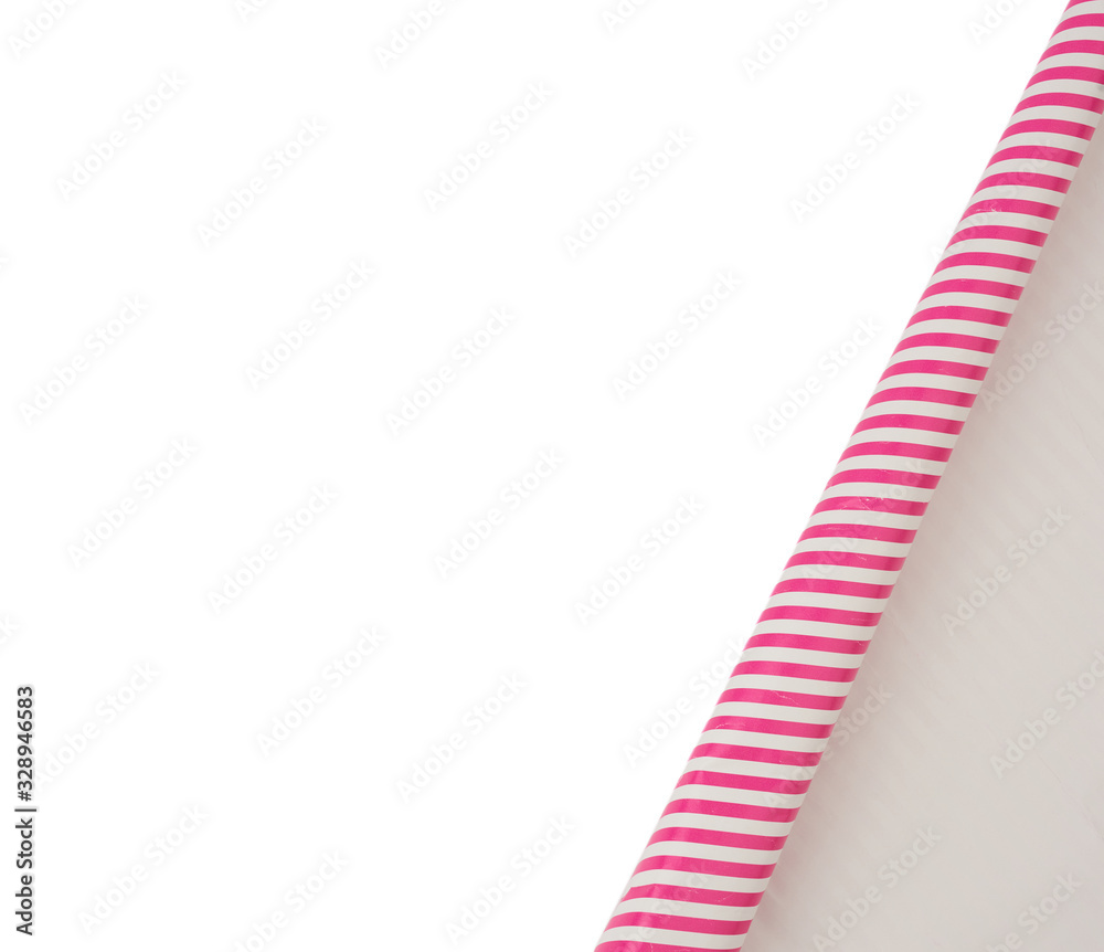curved edge of a pink paper sheet is isolated on a white background curved edge of a pink paper sheet is isolated on a white background