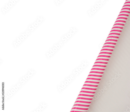 curved edge of a pink paper sheet is isolated on a white background