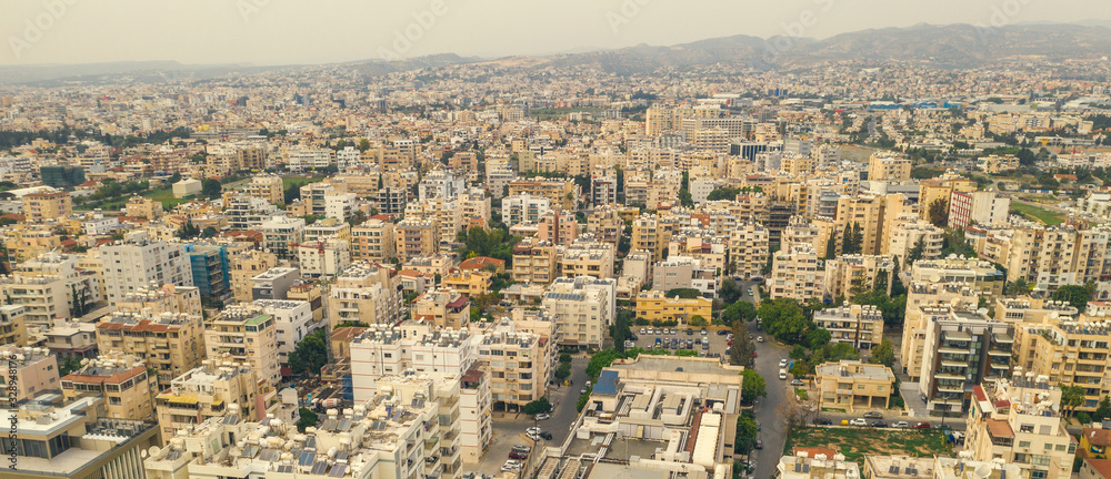 Aerial panorama of Limassol downtown with many buildings, Cyprus view from above.