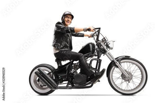 Elderly man riding a customized chopper motorbike