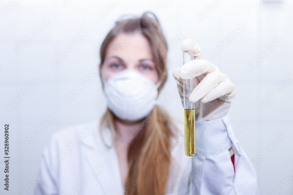 Doctor girl showing virus test at laboratory. Doctor girl showing virus test at laboratory.
