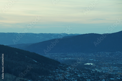 A city in valley between mountains. © oleksandr