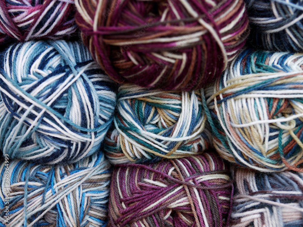 Close-up of colorful knitting wool yarn balls.
