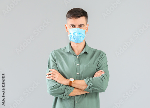 Young man with protective m...