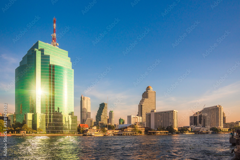 Bangkok Skyline as Seen from the Eastern Chao Phraya River Embankment at Sunset