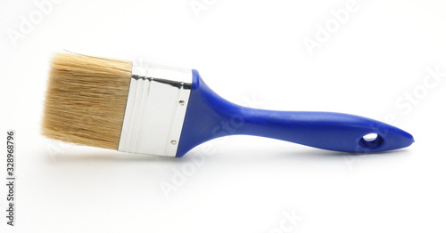 Blue paint brush on a white background photo