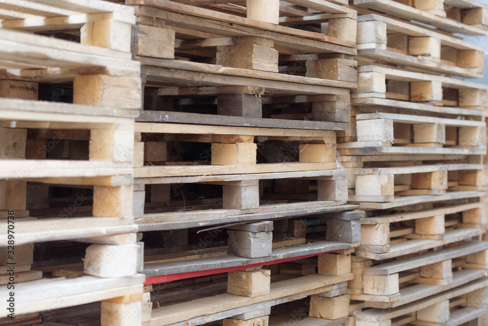 Pallets. A range of wooden pallets. Inventory for shipment in the warehouse. Pallets. A range of wooden pallets. Inventory for shipment in the warehouse.