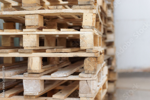 Pallets. A range of wooden pallets. Inventory for shipment in the warehouse.