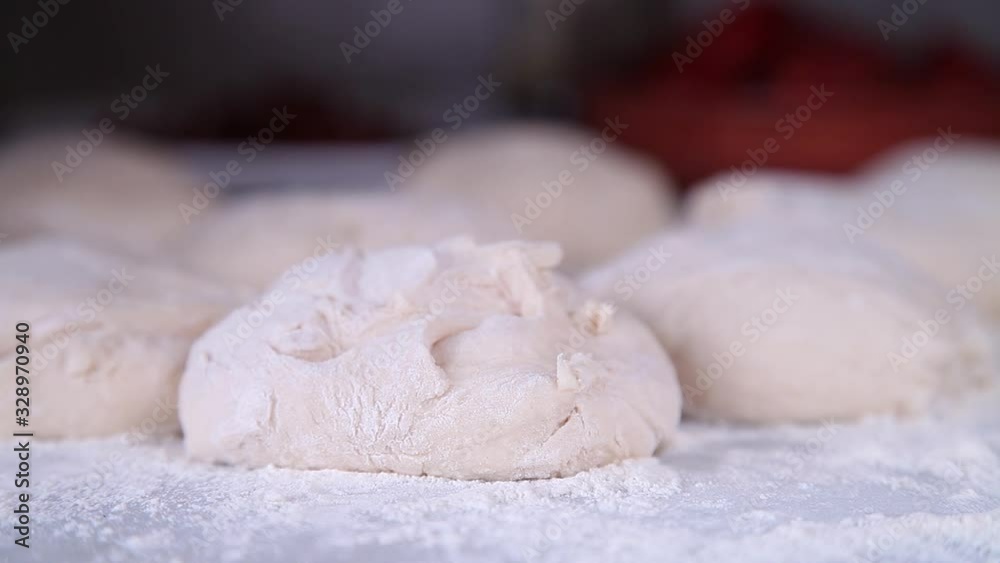 bread dough ready to go into the oven, slider shot bread dough ready to go into the oven, slider shot