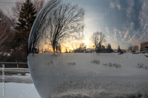 landscape reflected on sphere  photo