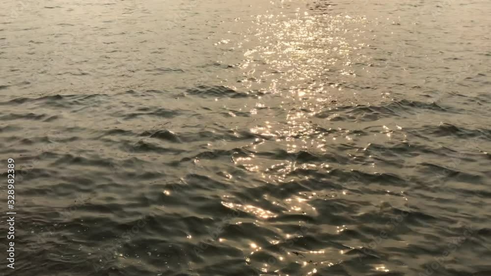 Sparkling sun beauty on a river surface. Soft wave of sea. surface of the water in the lake. Water waves in the lake. Sparkling sun beauty on a river surface. Soft wave of sea. surface of the water in the lake. Water waves in the lake.