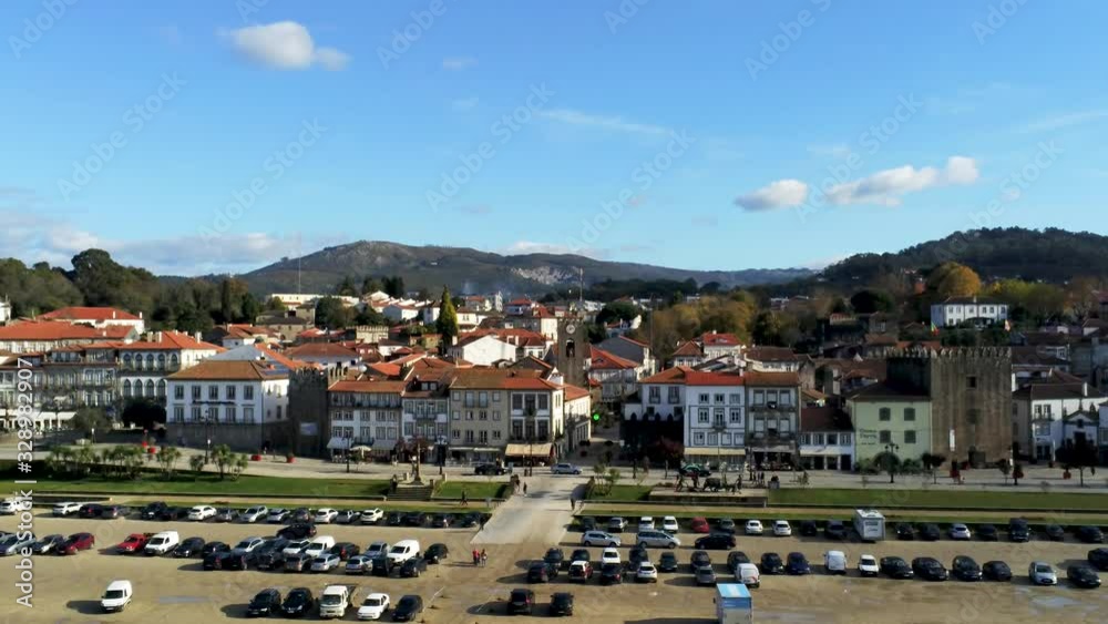 aerial view of Ponte de Lima m the oldest chartered town in Portugal. Carpark, houses and hills. aerial view of Ponte de Lima m the oldest chartered town in Portugal. Carpark, houses and hills.