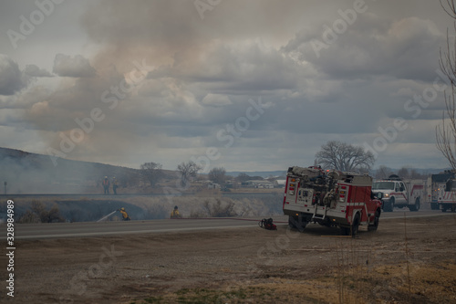 Wildland Engines Battling a Brush Fire