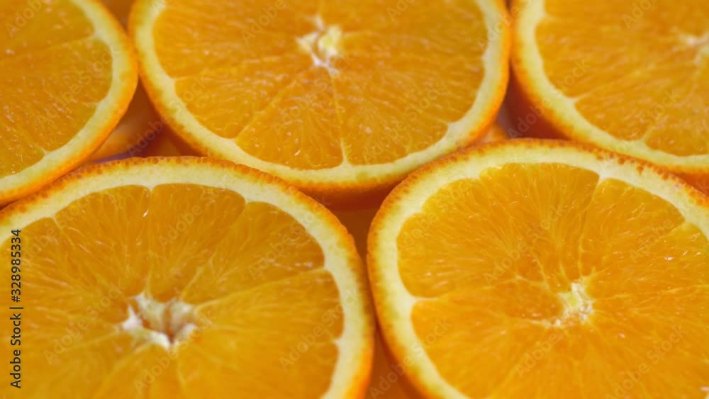 Marco shot of orange fruit and rotate.Close up flesh of orange. Marco shot of orange fruit and rotate.Close up flesh of orange.