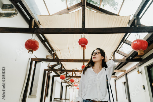 korean woman tourist walking in chinatown photo