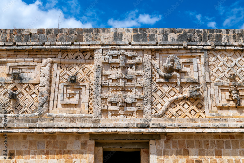 Architecture detail of the Nunnery Quadrangle inside the Mayan site of Uxmal near Merida, Yucatan Peninsula, Mexico.