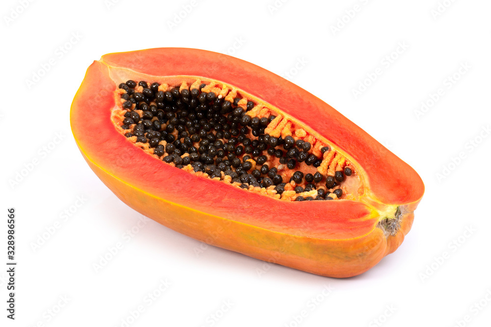 Ripe papaya with black seeds isolated on white background . Ripe papaya with black seeds isolated on white background .