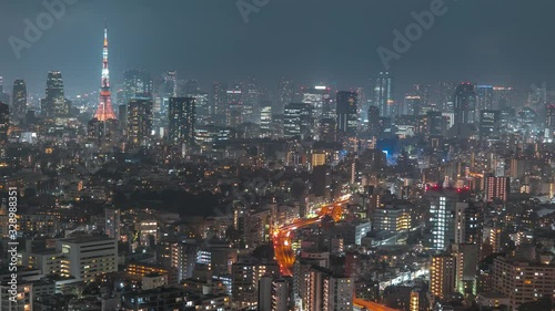 Wallpaper Mural Beautiful night timelapse of Tokyo, Japan. Cityscape skyline with Tokyo Tower. Wide shot, zoom out. Torontodigital.ca