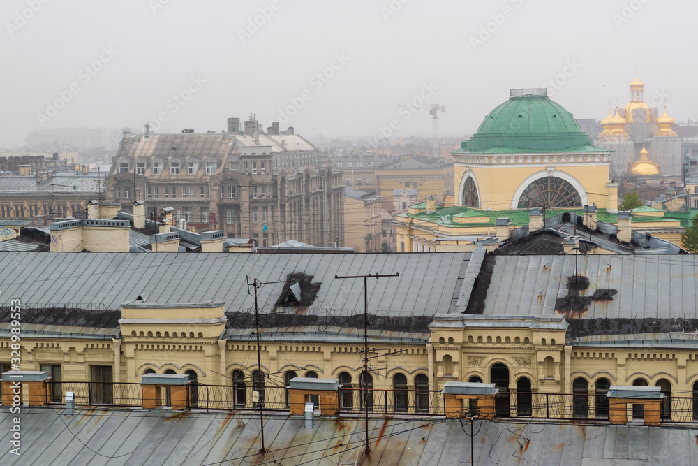 St. Petersburg. The view from the roof of the old house. The green roof of the St. Nicholas single-faith church on the street of Marat. Built in 1820-1838. designed by architect A.I. Melnikov.