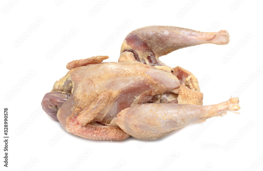 Raw chicken carcass isolated on a white background. Raw chicken carcass isolated on a white background.